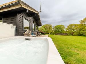 Chalet Sycamore Hot Tub Lodge by Interhome