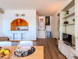 Apartment Attilio lake front view by Interhome