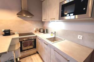 Appartements Studio La Maison Elisa : photos des chambres