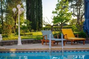 B&B / Chambres d'hotes Les Martinets : Chambre Lit King-Size - Vue sur Jardin