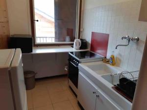 Appartements Appartement Chaleureux La Montagne : photos des chambres