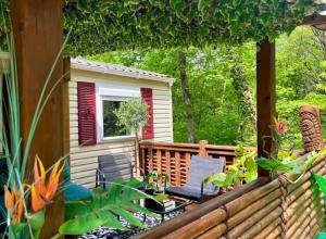 Campings Tiki House M-Home-Climatise - Belle parcelle ! : photos des chambres