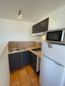 Maisons de vacances Maisonnette calme vue collines : photos des chambres