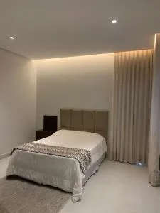 Lima suítes aconchegantes próxima a Capitólio e Canastra - بيوي