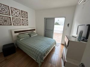 Apto terreo 50 metros da praia do Guaruja