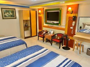 Phòng Tiêu Chuẩn 4 Người (Standard Quadruple Room)