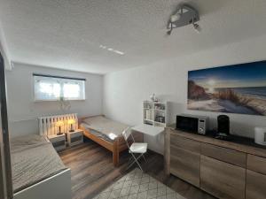 1-Raum Ferienwohnung Souterrain Niederorschel