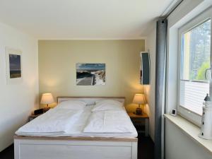 Ferienwohnung KWE 10 OG "Eikkater"