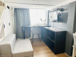 "Stylish Loft Condo with High-Speed WiFi at Avida Towers"