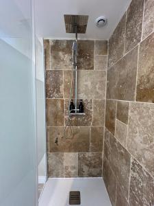 Appartements Le Troglodyte - Home Homy : photos des chambres