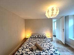Appartements Le Troglodyte - Home Homy : photos des chambres