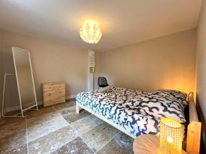 Appartements Le Troglodyte - Home Homy : photos des chambres