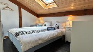 Appartements Jolie maison de vacances avec terrasse et jardin : photos des chambres