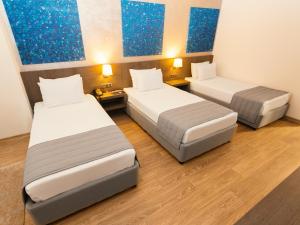 Superior Triple Room room in Fesa Business Hotel