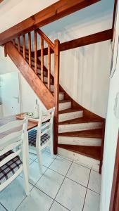 Appartements Jolie maison de vacances avec terrasse et jardin : photos des chambres