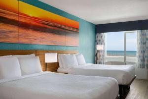 Queen Room with Oceanfront - Mobility Accessible/Ground Floor/Non-Smoking room in Days Inn by Wyndham Myrtle Beach-Beach Front