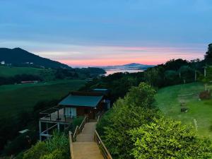 Casa com jacuzzi e piscina aquecida- Praia do Rosa-SC