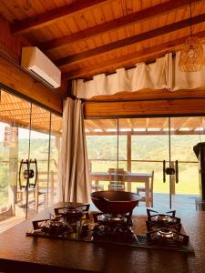 Casa com jacuzzi e piscina aquecida- Praia do Rosa-SC