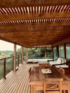 Casa com jacuzzi e piscina aquecida- Praia do Rosa-SC