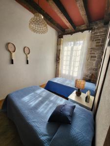 Maisons de vacances Grande maison avec jardin, tennis et piscine prives dans le calme dun vieux village lotois : photos des chambres