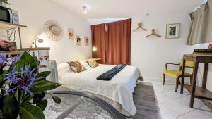Appartements A la ville comme a la campagne : photos des chambres
