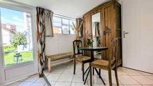 Appartements A la ville comme a la campagne : photos des chambres