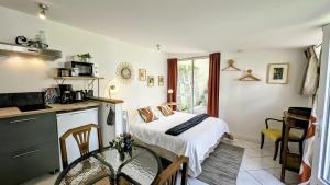 Appartements A la ville comme a la campagne : photos des chambres