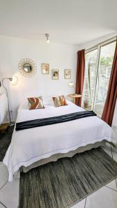 Appartements A la ville comme a la campagne : photos des chambres