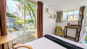 Appartements A la ville comme a la campagne : photos des chambres