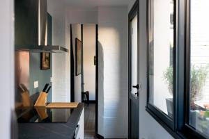 Maisons de vacances Le 5 - maison de style centre ville Normandie : photos des chambres
