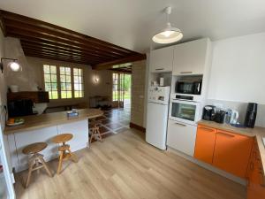 Sejours chez l'habitant L-Ecrin de Famille Maison Mer & Bourg Gold Beach : photos des chambres