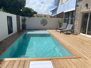 Maisons de vacances Villa balneaire a 300m de la mer Piscine&SPA : photos des chambres