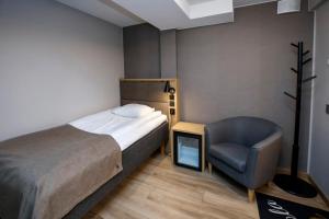 Single Room with Shared Shower and Toilet room in HOSTEL TOIVOLA