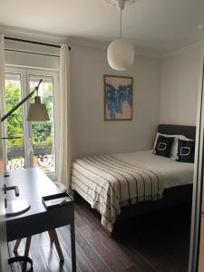Maisons d'hotes MAISON STANDING et SYMPA PROCHE ROLAND GARROS et METRO : photos des chambres