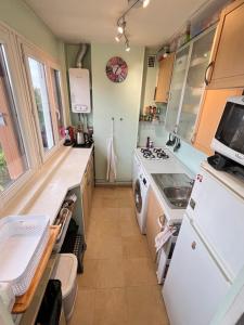 Appartements Sweet Home 1mn Train RER A et 10mn de Paris : photos des chambres