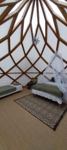 Tentes de luxe Les Cabanes d'ErbeFol : photos des chambres
