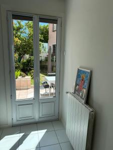 Appartements Appartement avec jardin - Le Citronnier : photos des chambres