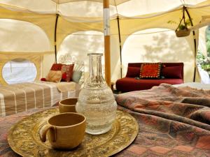 Tentes de luxe Les Cabanes d'ErbeFol : photos des chambres