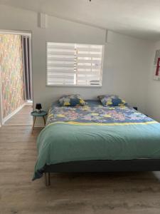 Appartements Gite COQUELICOT F2 avec piscine et SPA : photos des chambres