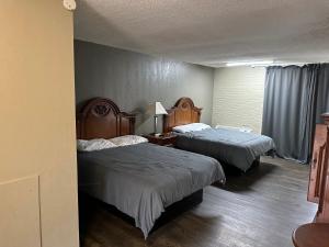 Standard Queen Room with Two Queen Beds room in Stay Express Inn Greensboro