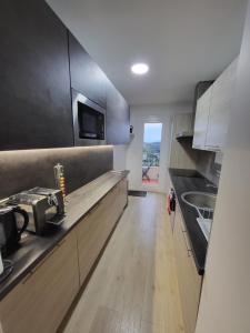 T3 avec magnifique vue montagne, 3 étoiles, piscine et parking, clim