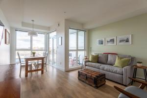 Urban Stay With Balcony And In-Unit Laundry