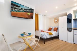 Appartements STUDIO Boulogne Roland Garros : photos des chambres