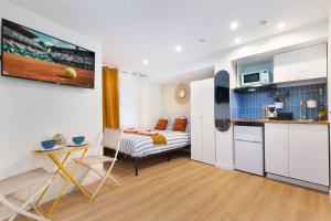 Appartements STUDIO Boulogne Roland Garros : photos des chambres