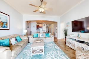 Spacious fourth-floor beachfront condo with pools, hot tub, fitness room