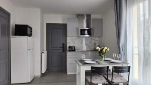 Maisons d'hotes Chambre privee pour 4 personnes en banlieue parisienne a Bondy : photos des chambres