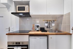 Appartements Appartement 2 pieces Boulogne Roland Garros : photos des chambres