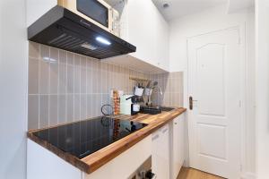 Appartements Appartement 2 pieces Boulogne Roland Garros : photos des chambres