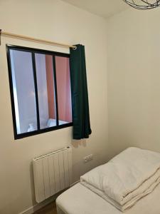 Appartements 4, 5 et 10 personnes renoves en centre-ville : photos des chambres