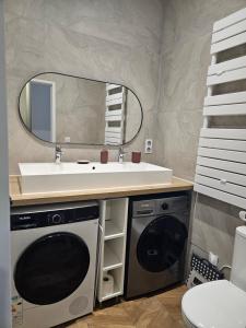 Appartements 4, 5 et 10 personnes renoves en centre-ville : photos des chambres